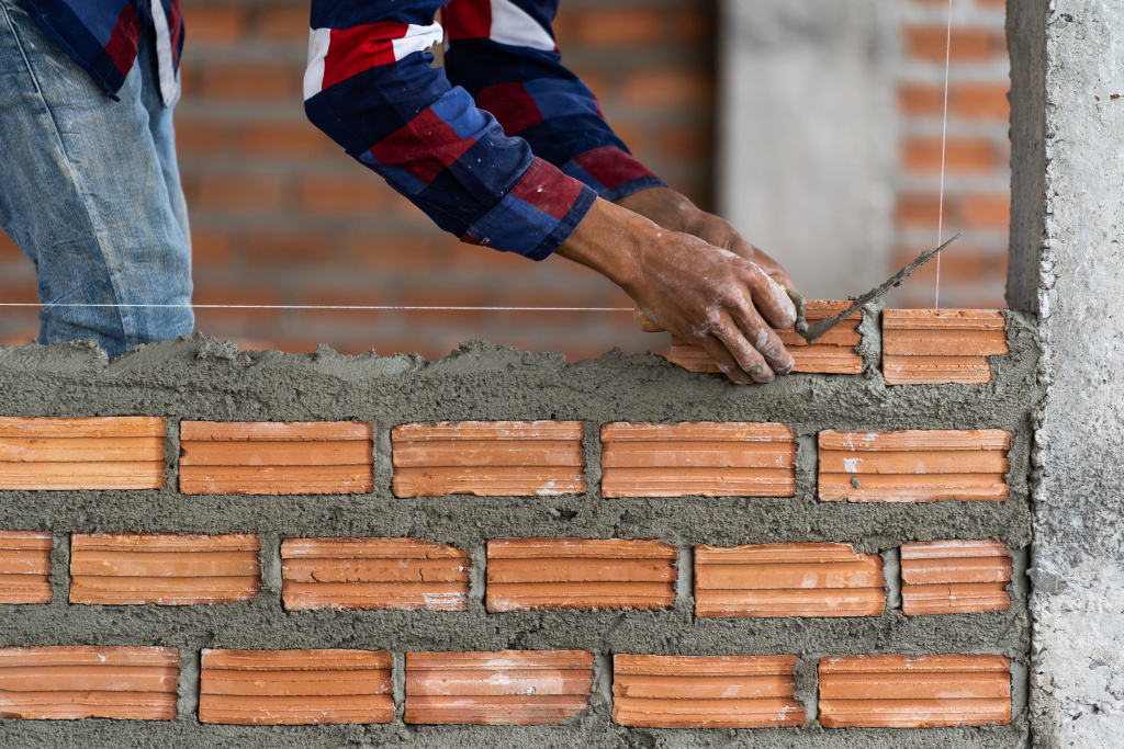 closeup-hand-professional-construction-worker-layi-2024-02-23-05-04-21-utc.jpg